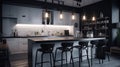 Modern minimalist kitchen in black and white with loft-style elements, spectacular lighting, counter and bar stools. Royalty Free Stock Photo