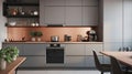 Modern minimalist kitchen interior. Gray flat facades, wooden countertop, built-in home appliances, work surface