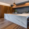 2 A modern, minimalist kitchen with a mix of white and natural wood cabinetry, a large waterfall countertop, and a sleek range h Royalty Free Stock Photo
