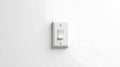 Modern minimalist light switch on a clean white wall representing control and energy efficiency Royalty Free Stock Photo