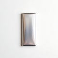 Modern minimalist rectangular metal wall mounted object against plain background Royalty Free Stock Photo