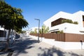 Modern minimalist white house exterior, street with new houses, Sitges, Spain