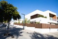 Modern minimalist white house exterior, street with new houses, Sitges, Spain