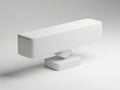 A modern and minimalist white rectangular object with a circular base on a light gray surface Royalty Free Stock Photo