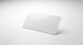 Modern minimalist white rectangular object with rounded edges and glossy surface isolated on plain light grey background 3D Royalty Free Stock Photo