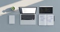 Modern minimalist workspace with laptop displaying code and notebook featuring mind map for creative programming concepts Royalty Free Stock Photo