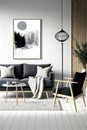 Modern minimalistic and stylish living room in scandinavian style with armchair coffee table and sofa. Royalty Free Stock Photo