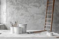 Modern minimalistic white kitchen under construction with painting tools and accessories in focus Royalty Free Stock Photo
