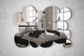 Modern mirror in the shape of pebbles hanging on the wall reflecting interior design scene, bright white and gray bedroom with bed Royalty Free Stock Photo