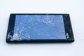 Mobile smart phone with broken screen on white backgrou Royalty Free Stock Photo