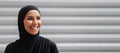 Modern Modesty. Portrait Of Smiling Young Muslim Woman In Hijab Posing Outdoors Royalty Free Stock Photo