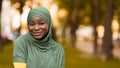 Modern Modesty. Shy Beautiful Black Religious Woman In Hijab Posing Outdoors Royalty Free Stock Photo