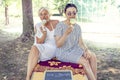 Modern mom and young daughter eating ice cream Royalty Free Stock Photo