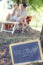 Modern mom and young daughter eating ice cream Royalty Free Stock Photo