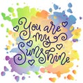 Modern mono line calligraphy lettering of You are my sunshine with hearts in dark blue on watercolor background