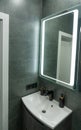 Modern monochrome grey bathroom interior decor with sink