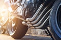 Modern motorcycle and exhaust details parking on street Royalty Free Stock Photo