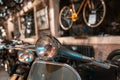 Modern motorcycle headlight closeup. Royalty Free Stock Photo