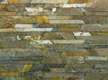 Modern Multi Color Stone, slate travertine sandstone Wall used for Background Royalty Free Stock Photo