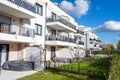 Modern multi-family apartment buildings with balconies and gardens Royalty Free Stock Photo