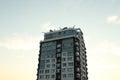 Modern multi-storey building against sky in sunset Royalty Free Stock Photo