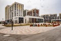 Modern multi-storey building in a new district of Moscow on a spring day