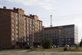 Modern multi-storeyed buildings with telecommunications tower behind Royalty Free Stock Photo