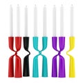 Modern multicolored candlesticks with candles isolated on white