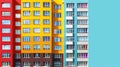 Modern multicolored multistory high-rise residential apartment building house. Front view with windows balconies with roof on Royalty Free Stock Photo