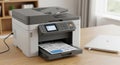 Modern multifunction printer with open paper tray on a wooden desk Royalty Free Stock Photo