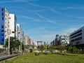 Modern Nanterre pedestrian street with La Defense in the background, Paris, France