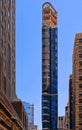 modern narrow building skyscraper and architecture with blue sky in manhattan in new york Royalty Free Stock Photo