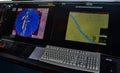 Modern navigation control panel showing radar and gps data on ship bridge Royalty Free Stock Photo