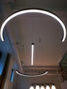 Modern neon lighting fixture and ventilation piping