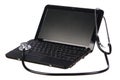 Modern netbook with a stethoscope over it Royalty Free Stock Photo