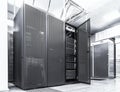 Modern network and telecommunication technology computer concept: server room in datacenter. Black white