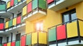 Exterior of a modern multi-story apartment building - facade, windows and balconies. Royalty Free Stock Photo