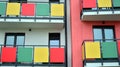 Exterior of a modern multi-story apartment building - facade, windows and balconies. Royalty Free Stock Photo