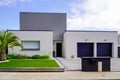 Modern new detached storey house grey fence on suburb street home Royalty Free Stock Photo