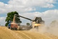 Modern New Holland combine harvester cutting crops