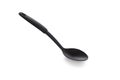 Modern non stick plastic ladle in black color for stir soup or scoop on white isolated background with clipping path. Perfect