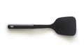Modern non stick spade of frying pan or spatula in black color and stainless steel on white isolated background with clipping path Royalty Free Stock Photo