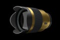 Modern nonexistent gold DSLR macro camera lens on black background Royalty Free Stock Photo