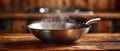 Modern Nonstick Wok on Wooden Table with Steam. Concept Cookware, Kitchenware, Food Photography,