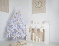 Modern nterior of fireplace with christmas tree and presents in white Royalty Free Stock Photo