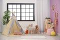 Modern nursery room interior with play tent