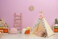 Modern nursery room interior with play tent