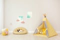 Modern nursery room interior with play tent