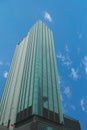 Modern office building against blue sky. Low angle shot. Royalty Free Stock Photo