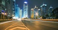 Modern office building background of night with light trails Royalty Free Stock Photo